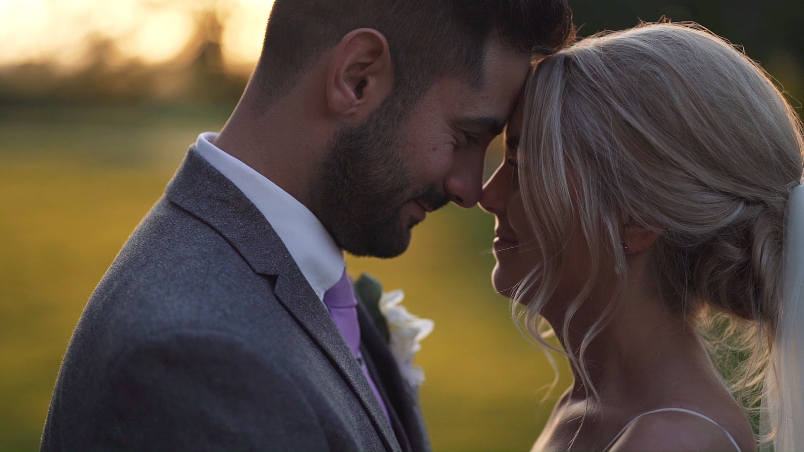 Dan and Sarah in front of a beautiful sunset