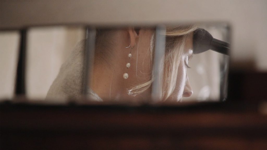 Bride having her make up
