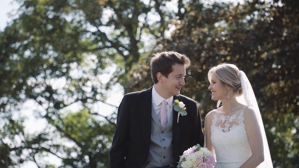 Bride and Groom sat at Langar Hall