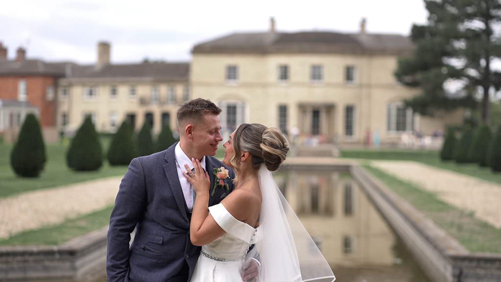 Couple in front of Stubton Hall Fountains