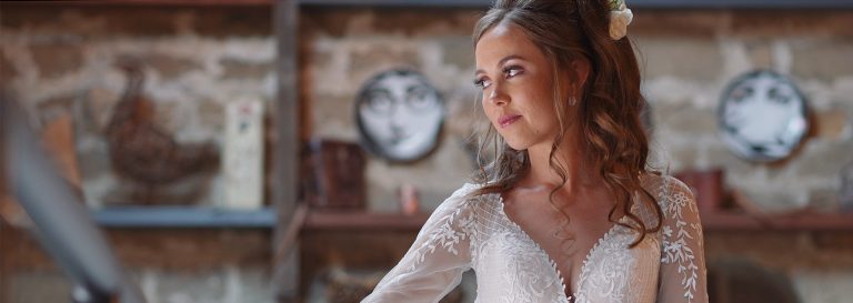Bride posing in natural light of hallway in Wharfedale Grange venue
